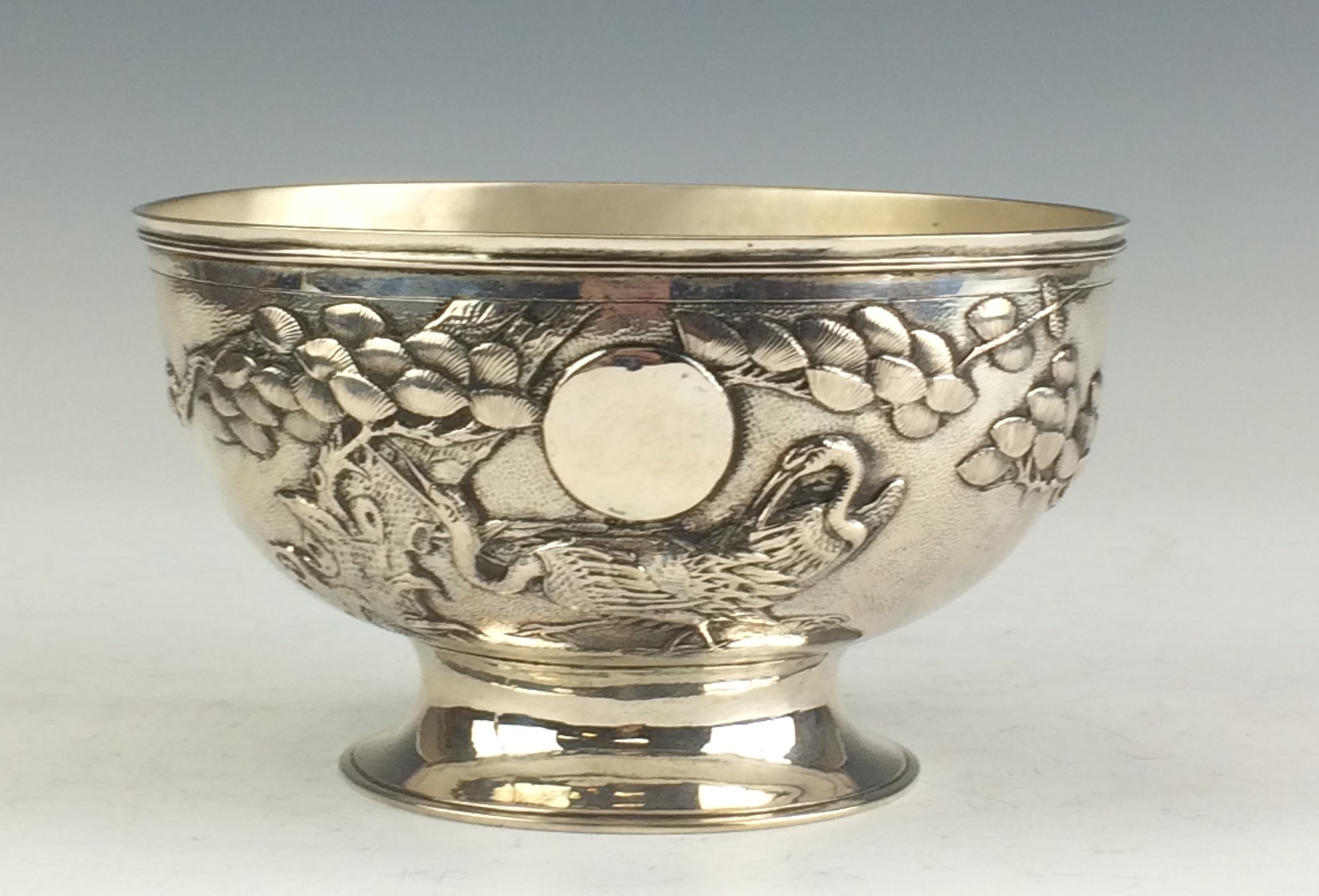 An early 20th Century Japanese silver Bowl, Meiji Period,Decorated with tsuru (crane), pine and a