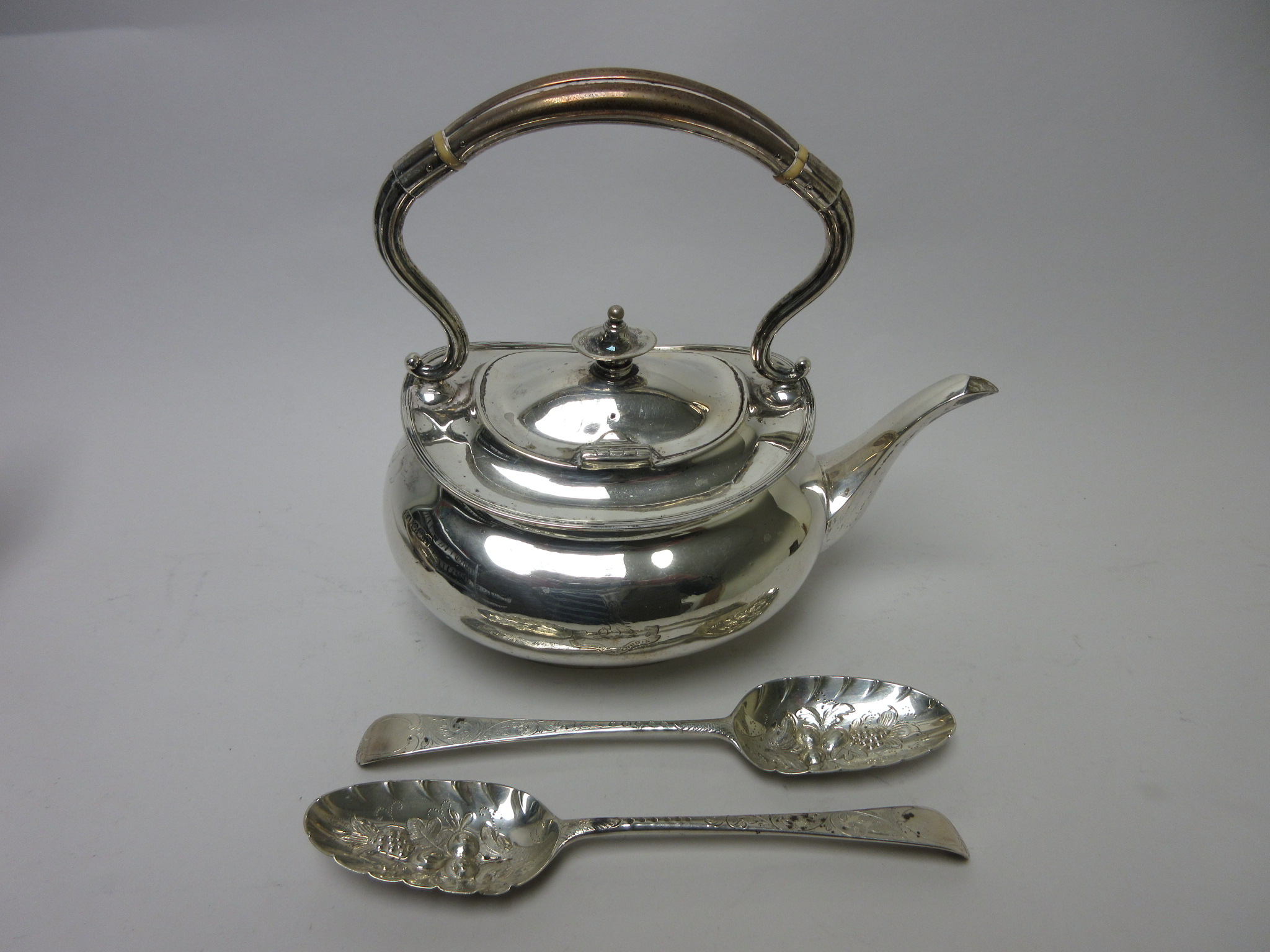 A Victorian silver boat shape Tea Kettle engraved crest, Sheffield 1894 and a pair of Georgian