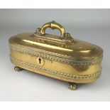 An Indian oval brass CasketProbably Keralathe stepped hinged lid with central handle, scallop