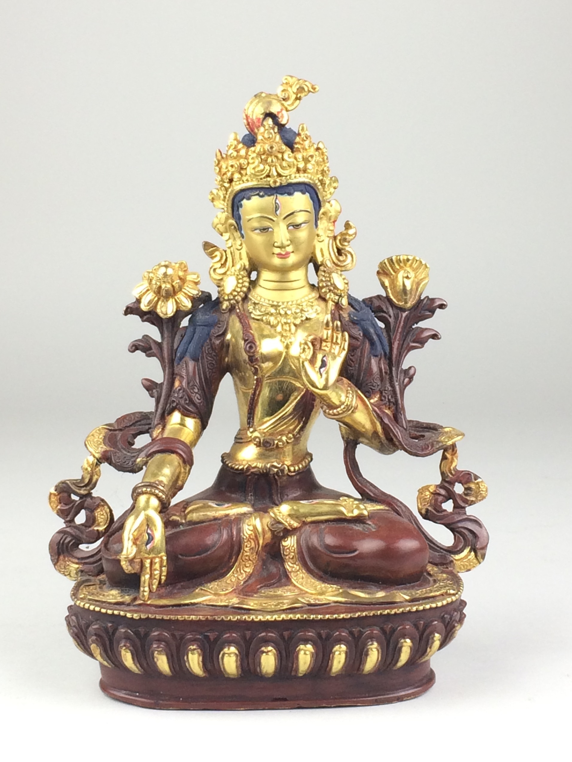 A late 20th Century parcel gilt copper alloy Figure of Tara,Nepal, Seated in lalitisana on a lotus