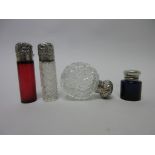 Four silver lidded glass Scent Bottles including one blue and one red, Birmingham 1887, 1893,