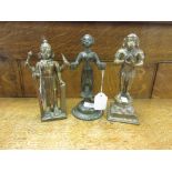 Two Indian brass Figures of deities and a bronze Lamp Base, 19th/20th CenturyComprising Hanuman on