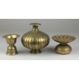 Three 18th Century Indian engraved brass items,Comprising a double bell shaped spittoon, another