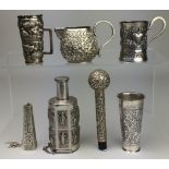 A group of Anglo-Indian silver, 19th/20th Centurycomprising two Spirit Measures, Bell, Parasol