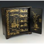 A 19th Century Chinese black and gold lacquered Table Cabinet, 12 ¾ in high