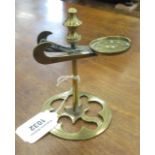 A Georgian brass Wax Jack Taper Stick, of scissor type on slender stem with pierced circular base,