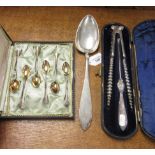 A Russian silver large Serving Spoon engraved initial E, marked 875, six silver gilt Teaspoons,