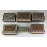 A group of Anglo-Indian sandalwood, ivory and sadeli small Boxes, c. 1900, Including two carved with