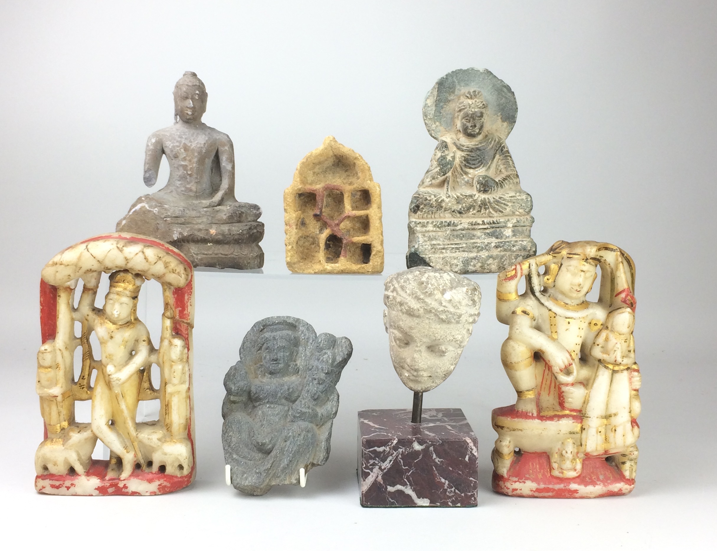 A collection of fragmentary Indian stone Carvings,including a Gandhara Buddha and two Rajasthan - Image 2 of 3