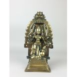 A South Indian brass Figure of Mahishasuramardini Durga, 17th/18th C. Probably Karnataka,holding the