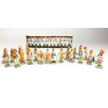 A group of 20th Century Indian pottery Figurines, Lucknow,Including a 12-piece military band in