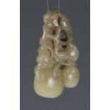 A good Chinese jade "double-gourd" pendant, 18th/19th CenturyCarved in the round as a large double