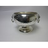 A George V silver Rose Bowl with leafage rim, lion mask and ring handles, Birmingham 1926