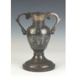 A 19th Century Bidri twin-handled urn shaped Vase, Deccan, The flared neck above ovoid body and