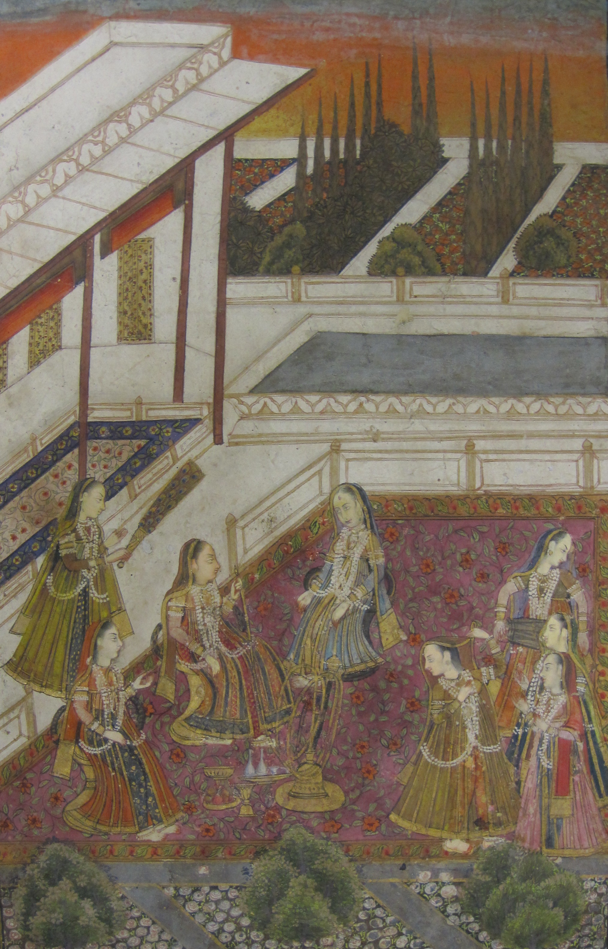 BIKANER SCHOOL, RAJASTHAN, INDIA circa 1700A Noblewoman smoking a huqqa with attendants, and a dance