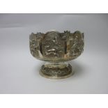 An Indian silver Bowl embossed and chased hunting scenes with figures, elephants, deer, lion, etc,