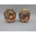 A pair of Royal Worcester Ginger Jars and Covers with domed tops, painted peaches, apples, pears,