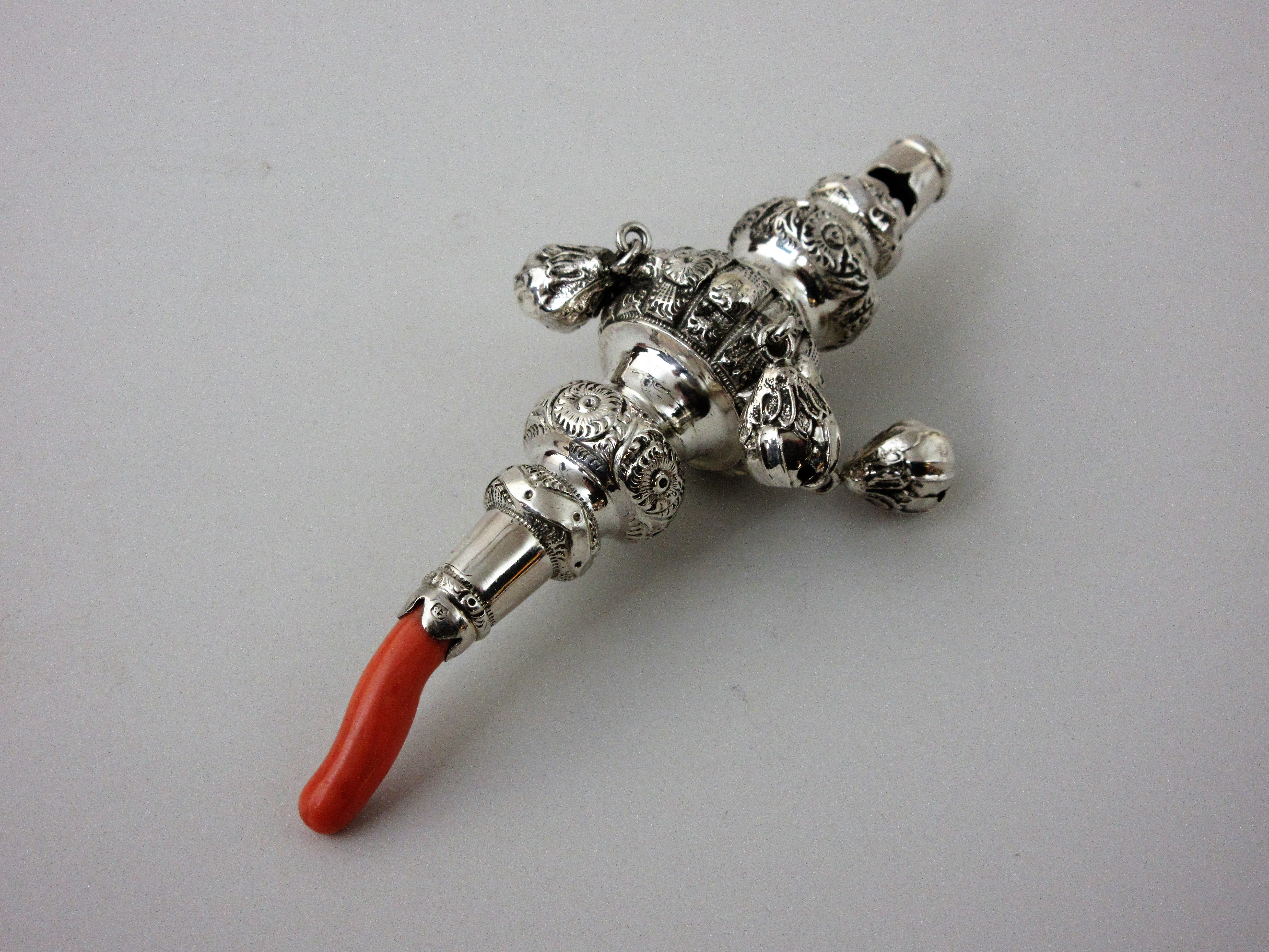 A Victorian silver Rattle with rosette embossing and four applied bells, Birmingham 1894 - Image 5 of 5