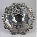 An interesting Edward VII silver armorial Tazza with beaded, chased, and pierced foliate and