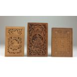 Three 19th Century Indian carved sandalwood Card Cases,One decorated with deities in medallions from