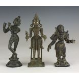 Three 19th Century Indian bronze Figures, Comprising Krishna playing the flute, a Gujarati