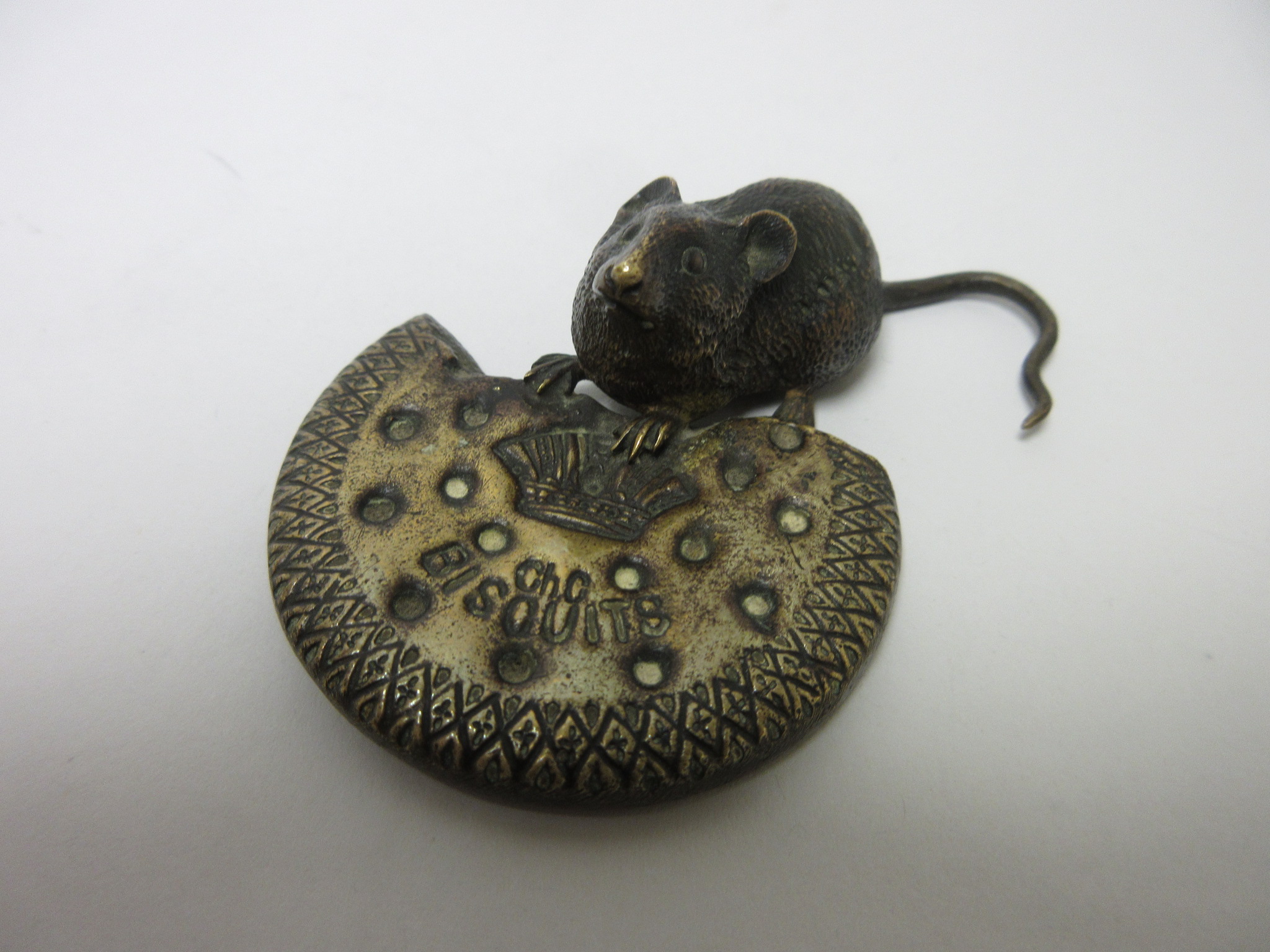 An Austrian cold painted bronze Figure of a Mouse with a biscuit, 3 1/2in, No. 1064