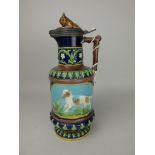 A George Jones Majolica Jug moulded panels with dogs hunting duck and rabbit, moulded scroll and