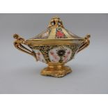 A Royal Crown Derby small oval lidded Tureen, the cover with pierced moulded finial, the base with