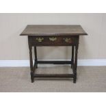 An 18th Century oak Side Table fitted single drawer on turned and square supports, square