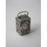 A Victorian silver cased small Carriage Clock with scroll embossing, London 1897, 3in