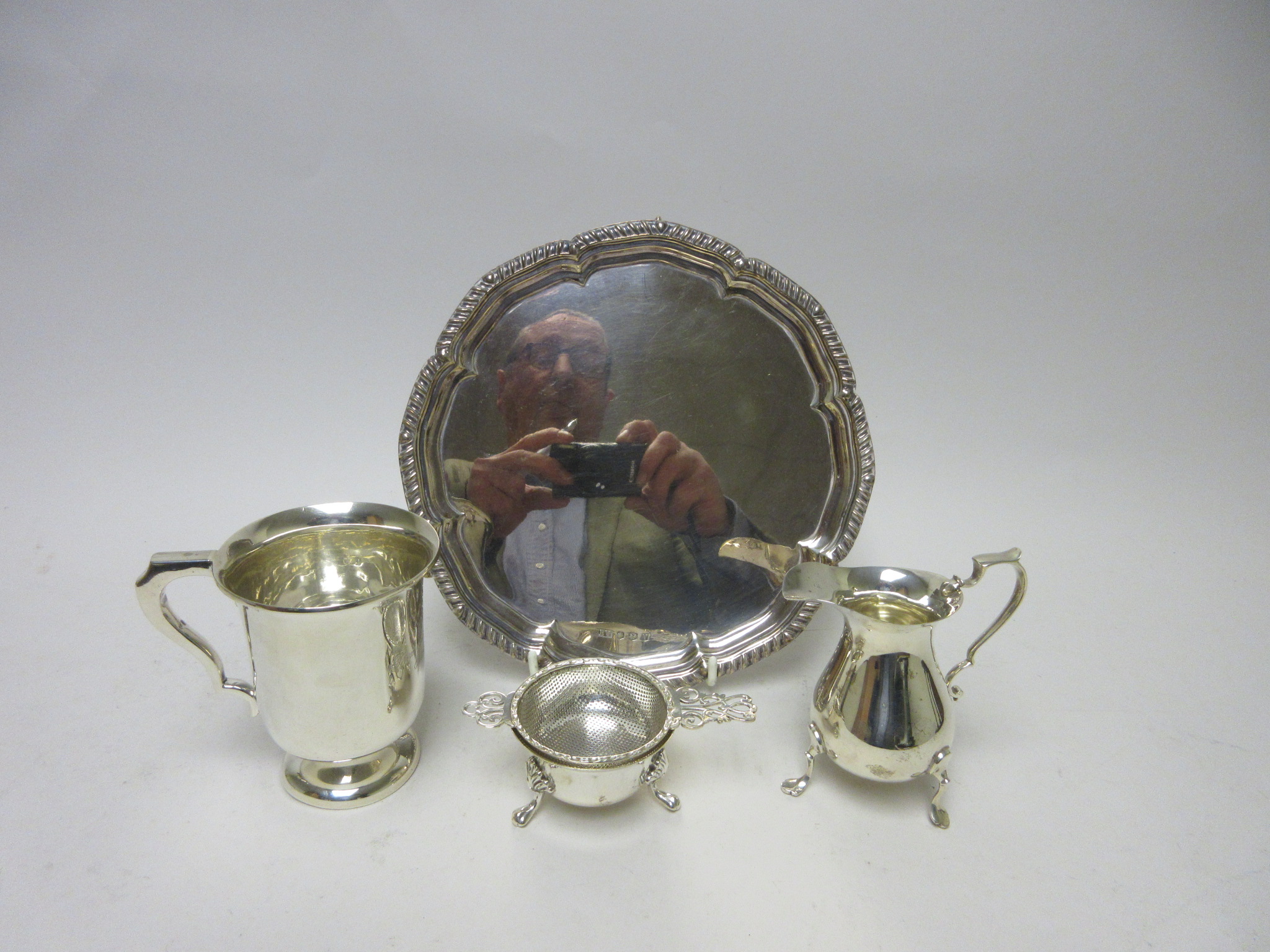 A George V silver circular Waiter with gadroon rim and scroll feet, engraved names to reverse, - Image 2 of 2