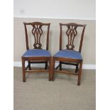 A pair of 18th Century elm Single Chairs with pierced splats, upholstered drop in seats on chamfered