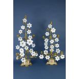 Two French gilt-metal and glass lily multi-branch Candlesticks on alabaster bases and turned feet,