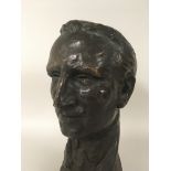 A bronze Bust depicting Raymond Hennifer Heaton (1874 - 1963), Director of Worcester Art Museum,