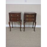 A near pair of walnut bow front Bedside Cupboards with cross-banded top above two short drawers on