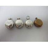 Three silver Sovereign Cases, one engraved initials, and another in gilt metal