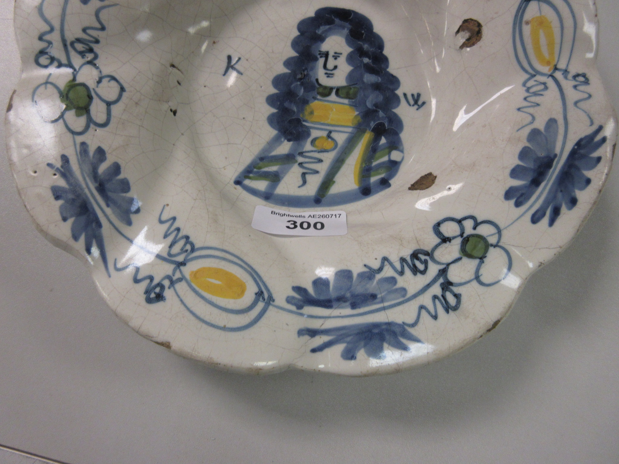 A late 17th Century Dutch Delft lobed Dish, painted to the centre with a naive portrait of William - Image 3 of 9