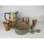 A large EP mounted oak Flagon and two Tumblers engraved initials, a similar Bowl, Biscuit Barrel and