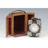 A silver mounted tortoiseshell Carriage Clock with white enamel circular dial, 4in, in leather