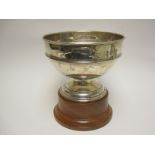 An Elizabeth II silver Rose Bowl embossed with greyhound, Birmingham 1965, on plinth