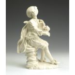 An 18th Century English porcelain Figure, c.1780, of a seated bagpiper, 7in high (repairs)