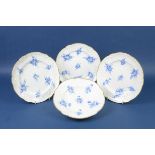 Four Nantgarw porcelain Plates, circa 1818-1820, comprising three dinner plates and a soup plate,