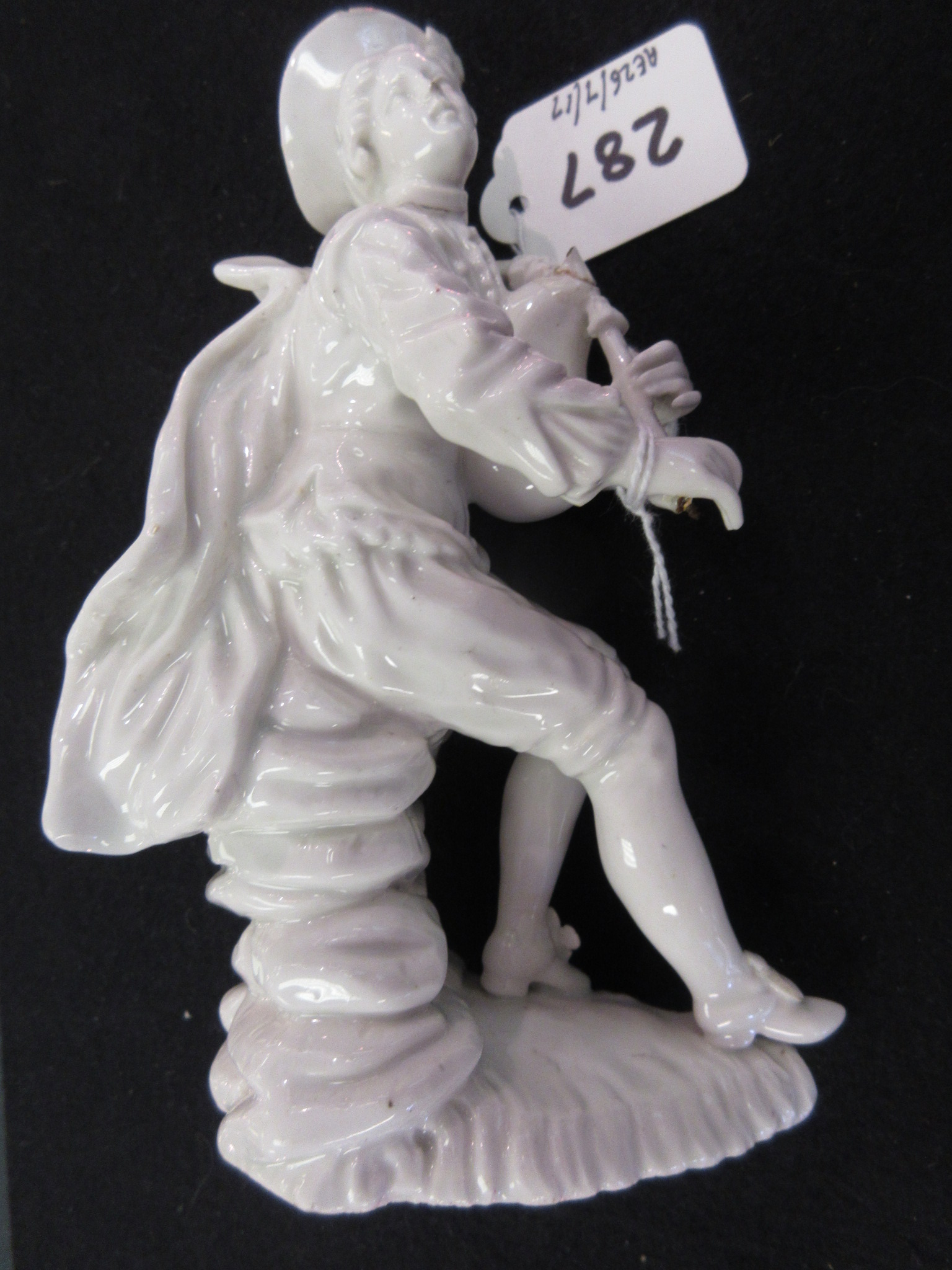 An 18th Century English porcelain Figure, c.1780, of a seated bagpiper, 7in high (repairs) - Image 8 of 9