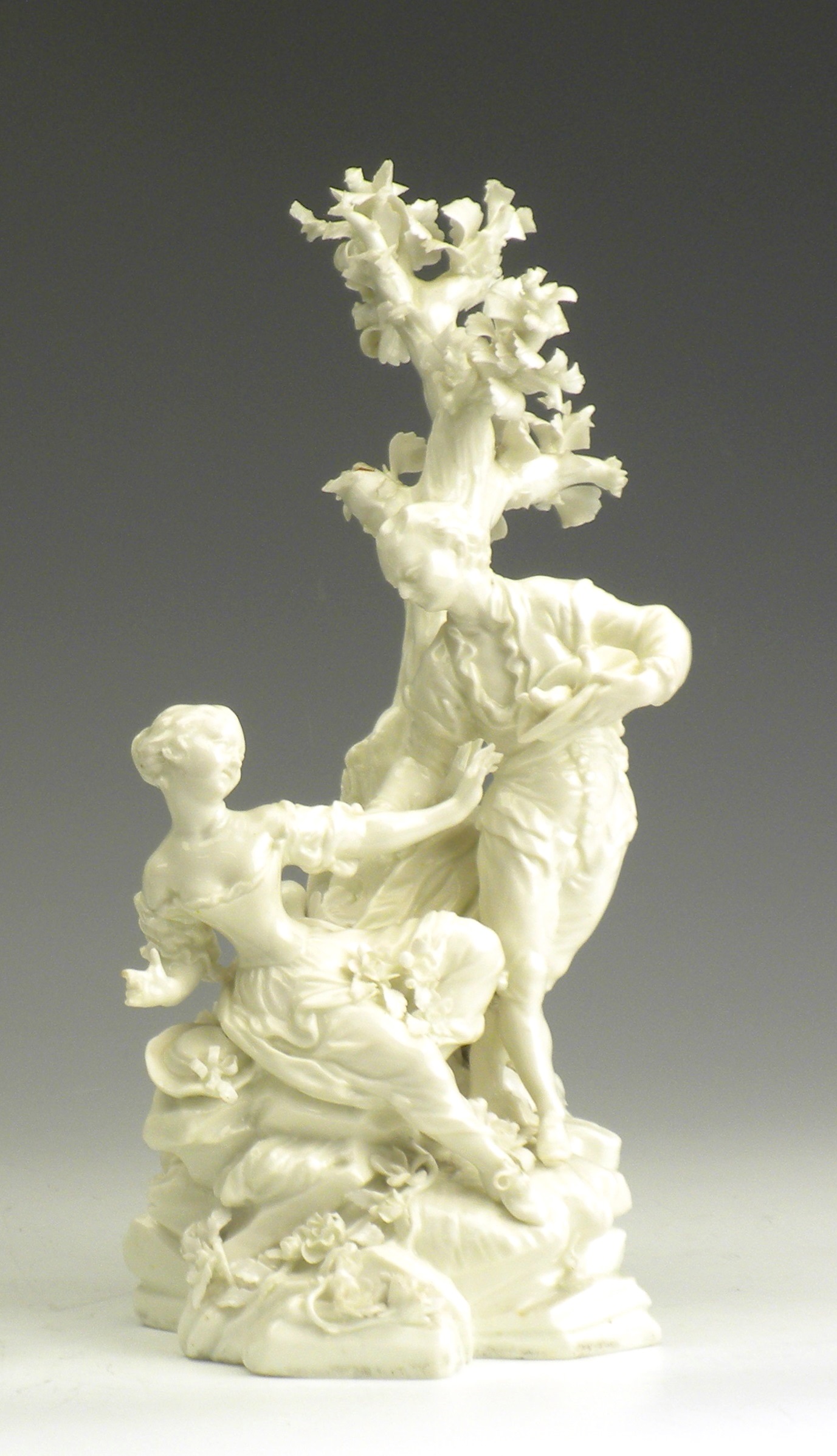 An 18th Century English white glazed porcelain Figure Group, c. 1780, possibly Derby, modelled