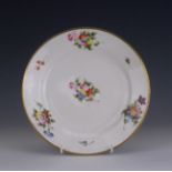 A Swansea porcelain Saucer Dish, circa 1815-1818, locally painted with sprigs and sprays of
