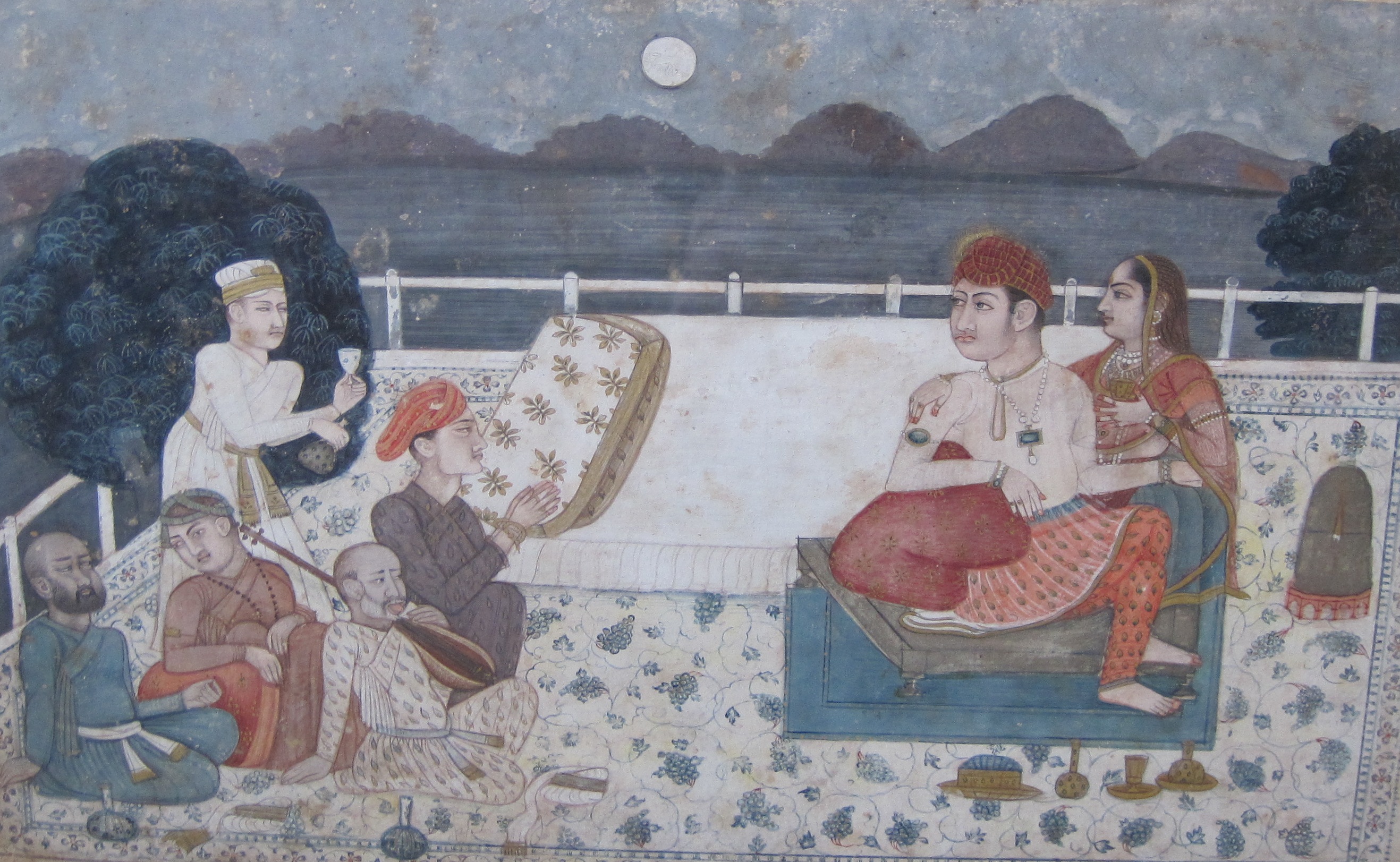 DECCANI (?) SCHOOL, LATE 18TH CENTURYA Prince listening to Musicians on a moonlit terrace with old