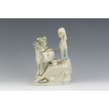 A Lladro Figure of a girl milking a goat 9 1/2in