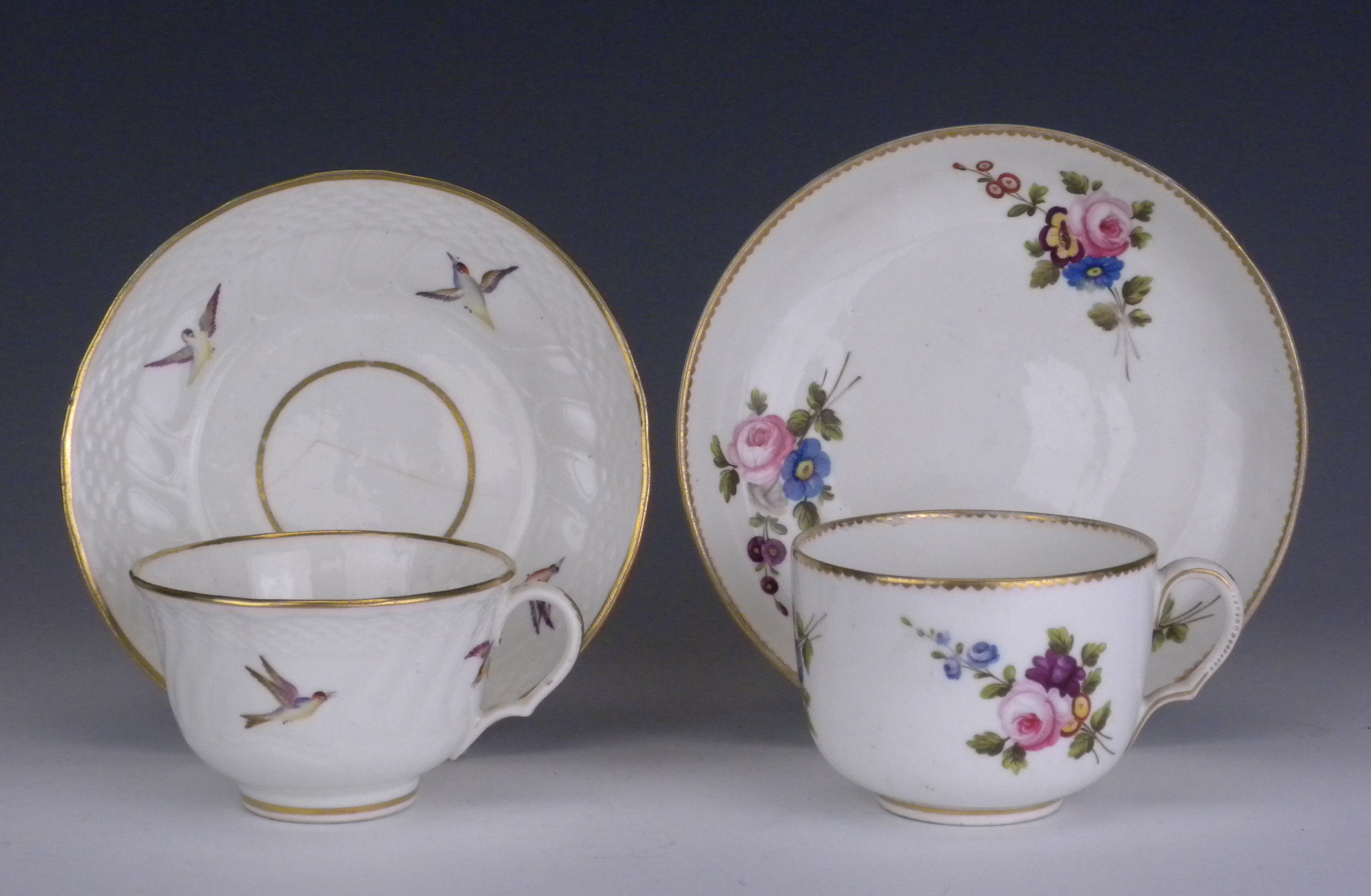 Two Swansea porcleain Teacups and Saucers, circa 1815-1818, one with ozier moulded and painted