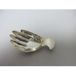 A George III silver Caddy Spoon in the form of a hand, London 1808