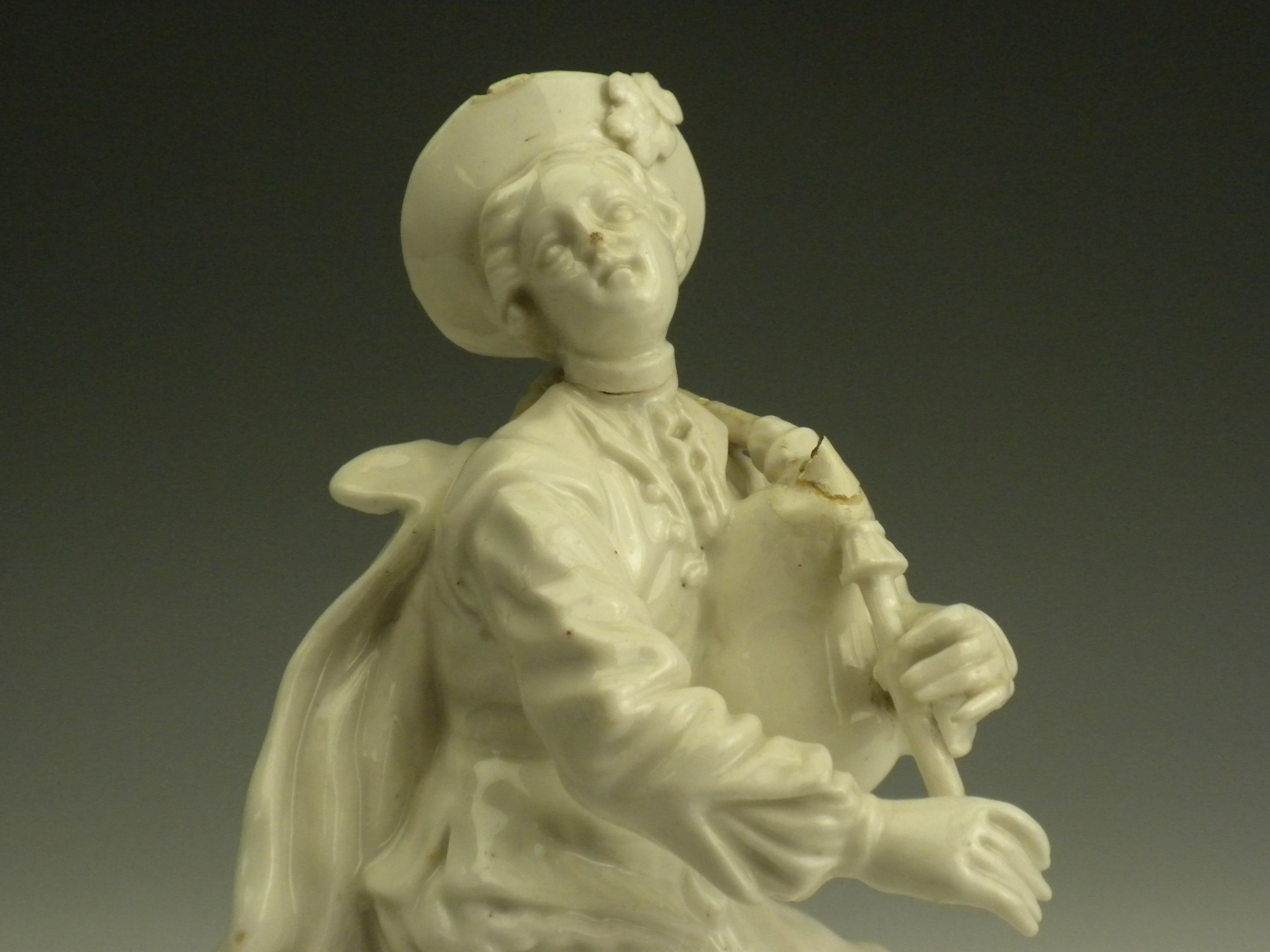 An 18th Century English porcelain Figure, c.1780, of a seated bagpiper, 7in high (repairs) - Image 4 of 9